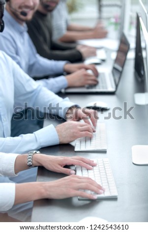 background image of a business team using computers
