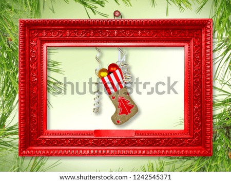 Santa Claus's New Year sock with gifts, toys and serpentine on  green background with pine