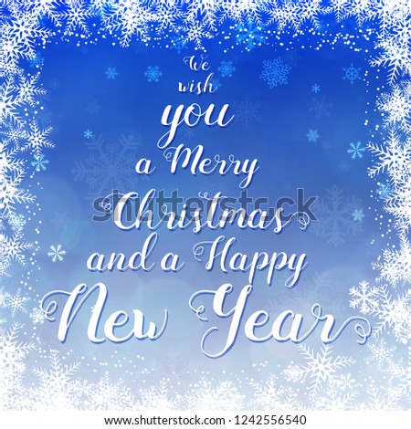 Christmas & winter greeting card template. Merry Christmas handwritten callighraphy tree shape on blue snowfall background.