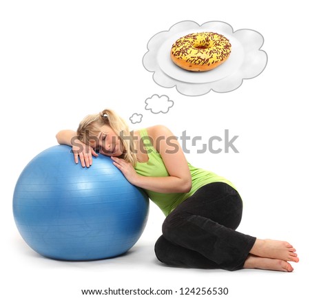 Funny picture of a hungry overweight woman dreaming on the ball. Weight loss concept.