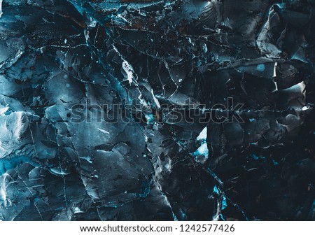 Rock texture. Stone background. Dark stone. Rock surface with holography. Royalty-Free Stock Photo #1242577426