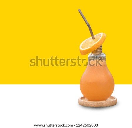 Orange juice in glass bottles, which are separate from the background.