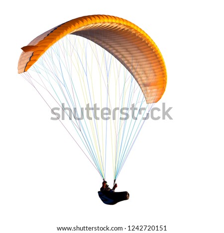 Beautiful paraglider in flight on a white background. isolated Royalty-Free Stock Photo #1242720151