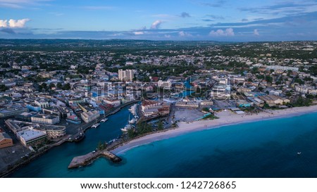 Public Beach of the Bridgetown with the Blue Water, Barbados Island Royalty-Free Stock Photo #1242726865