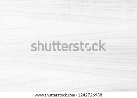 Old plywood textured wooden background or wood surface of the bright white at grunge dark grain wall texture of panel top view. Vintage teak surface board at desk  texture with light pattern natural. Royalty-Free Stock Photo #1242726958
