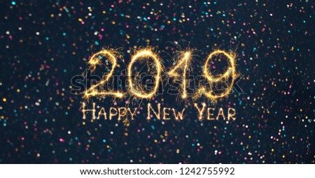 Greeting card Happy New Year 2019. Beautiful Wide Angle holiday web banner or billboard with Golden sparkling text Happy New Year 2019 written sparklers on festive bokeh background.