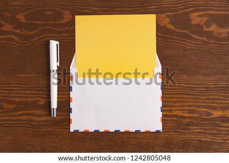 envelopes on wooden background