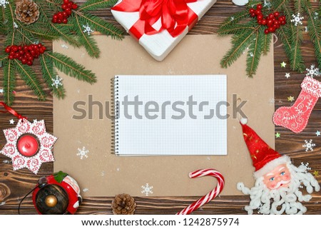 Christmas background.Xmas festive card,letter for Santa.Top view.Kraft paper for holiday greetings.New Year , holidays concept.