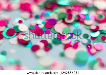 Blurred round bokeh lights of red and blue background for celebrating Christmas and New Year's party at night. Colorful bokeh background. Glitter blurry lights