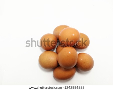 Many eggs on a white background.