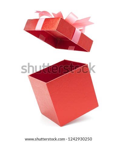 Christmas and New Year's Day ,Open red gift box white background Royalty-Free Stock Photo #1242930250