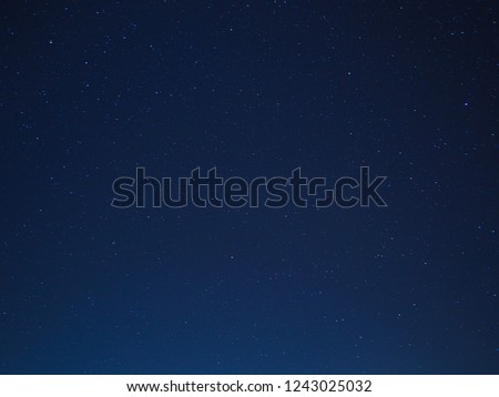 Blue dark sky with stars background