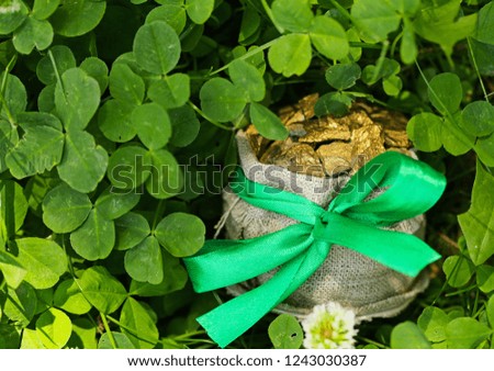 symbol of St. Patrick's Day, shamrocks, gold