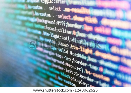 Programming source code HTML for Website development. Server logs analysis. Closeup developing programming and coding technologies. Developer working on web sites codes in office. 