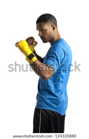 Portrait of male boxer on jab stance on a white background