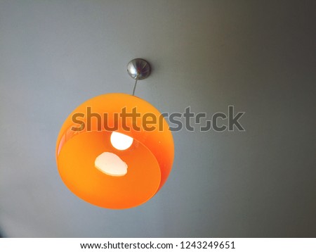 Orange lamp on the ceiling
