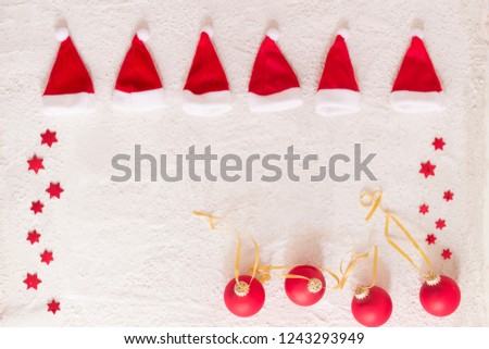santa hats on white concrete background