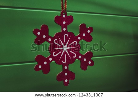 Christmas toys on a green background
