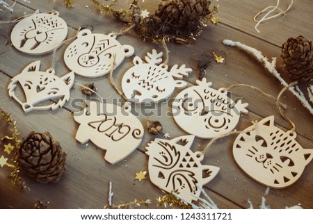 Beautiful natural wooden toys for festive tree. Forest animals collection.