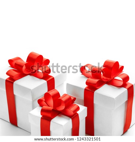 Christmas and New Year's Day. Three red gift box isolated on white background