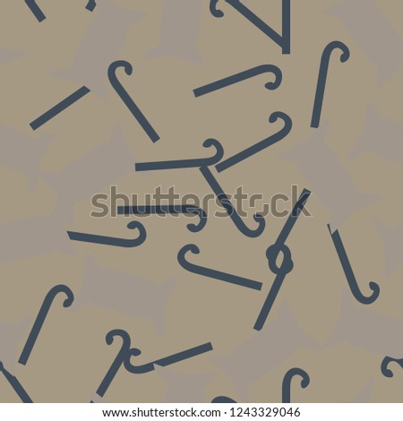 Christmas camouflage of various shades of beige and blue colors. It is a colorful seamless pattern that can be used as a camo print for clothing and background and backdrop or computer wallpaper