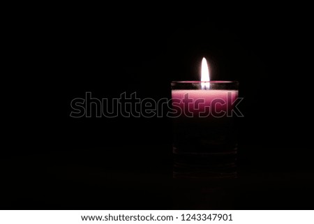 Right side of candlelight on night background