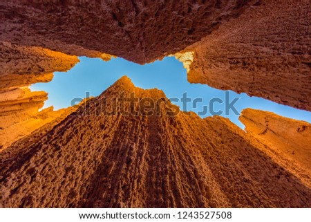 Cathedral Gorge State Park is located in a long, narrow valley in southeastern Nevada, where erosion has carved dramatic and unique patterns in the soft bentonite clay. Royalty-Free Stock Photo #1243527508