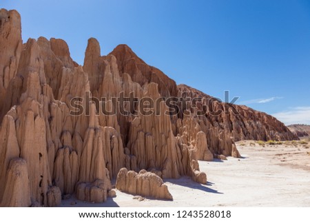 Cathedral Gorge State Park is located in a long, narrow valley in southeastern Nevada, where erosion has carved dramatic and unique patterns in the soft bentonite clay. 

 Royalty-Free Stock Photo #1243528018