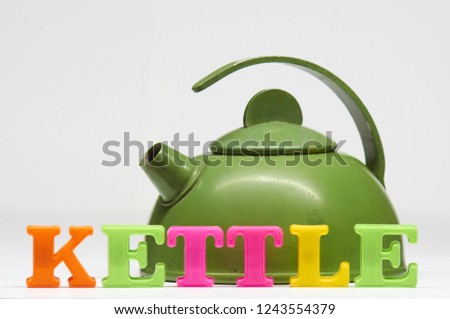  Multi-colored letters that make up the word kettle, symbolizing the need for children to learn the alphabet.  Education project.                           
