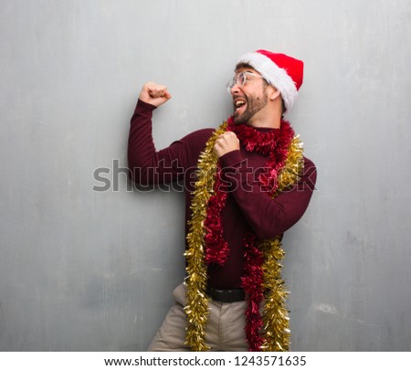 Young crazy man celebrating christmas
