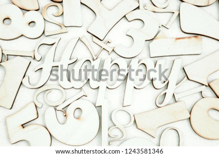 chaotic background of numbers from zero to nine and spell Happy. Background with numbers. Textures of numbers.
