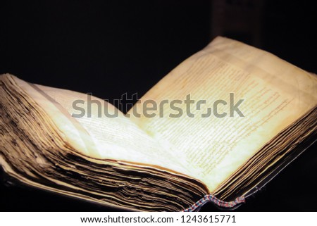abstract image of open antique book 