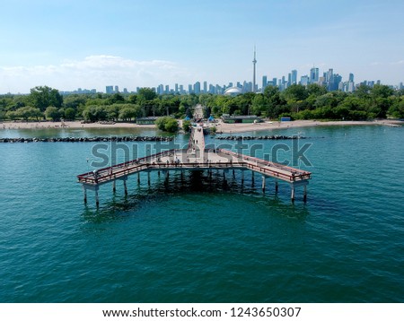 View of Toronto Centre Island Pier during summer. A lot of visitors. Aerial eye bird view.