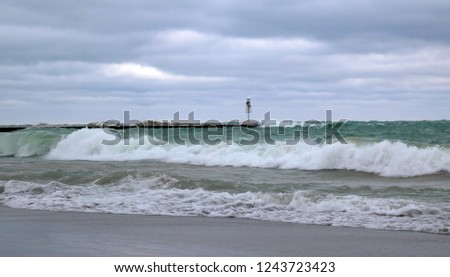 Powerful winter waves crashing onto Station Beach in Kincardine, Ontario