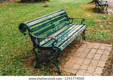 A bench in the park on a sunny day  background ,lonely