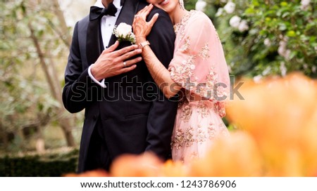 Indian Pakistani Newly Wed Couple Royalty-Free Stock Photo #1243786906