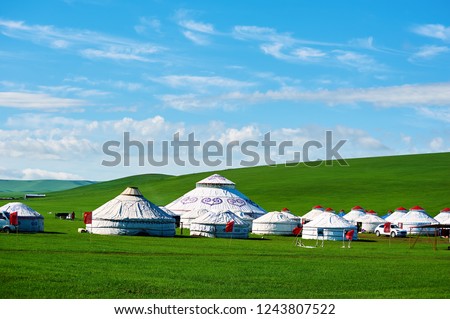Mongolia yurts in the summer grassland of Hulunbuir, Inner mongolia, China Royalty-Free Stock Photo #1243807522