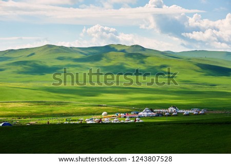 Mongolia yurts in the summer grassland of Hulunbuir, Inner mongolia, China Royalty-Free Stock Photo #1243807528