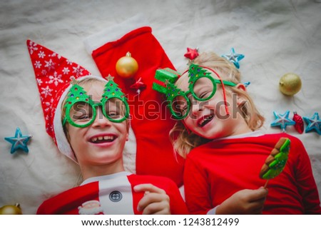 happy kids enjoy Christmas, smile, eat cookies