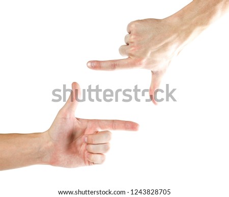 Hands shaped in viewfinder or frame. Isolated on white background