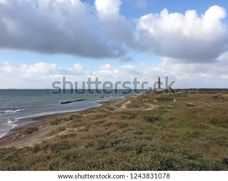 Unique natural scenery of Grenen, Denmark’s northernmost area where the sea meets the grass shore.