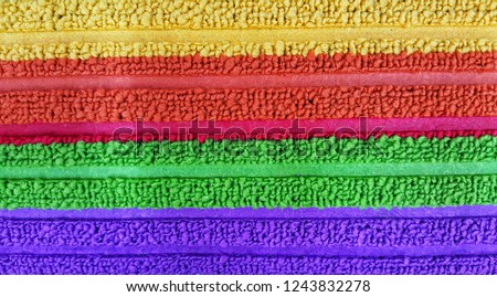 Rainbow color Door mat carpet texture background. 