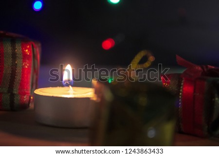 Group of gift box with candle in christmas night concept.