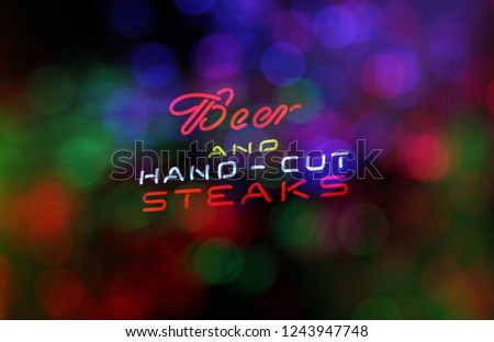 Neon Sign, Beer and Hand Cut Steaks