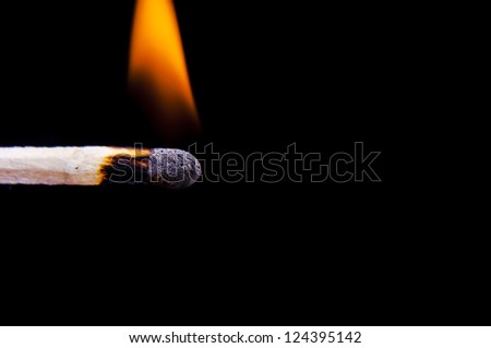 An image of firing match on black background