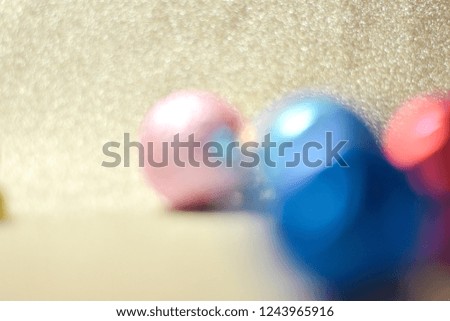 bluerred background with colorful ball.