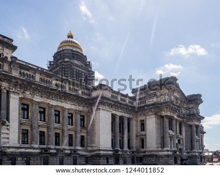 The side view of Palace of Justice located in Brussels city, Belgium Royalty-Free Stock Photo #1244011852