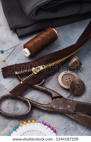 Tools for repair and tailoring. Concept on the topic of sewing