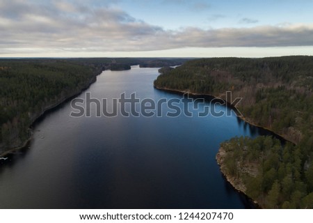 Beautiful landscape at Agelsjon, Norrkoping, Sweden, Scandinavia. Lovely nature on autumn day. Nice outdoors photo shot with drone in sky from above. Calm, peaceful, stillness and joyful.