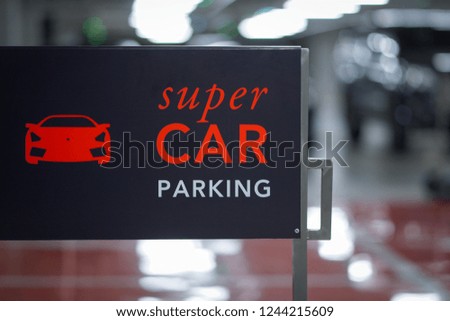 Super car parking sign.